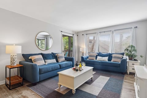 Natural light and comfortable seating make this the heart of the home.