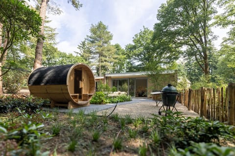 Private wooded patio with barrel sauna and grill retreat