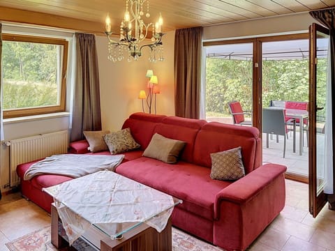 Furniture, Interior Design, Couch, Flooring, Floor, Room, Wood, Living Room, Ceiling, Table
