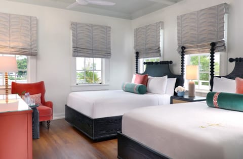 Recharge in a chic double room with sunny corner seating.