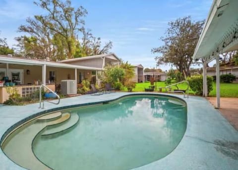 Private pool surrounded by tropical landscaping