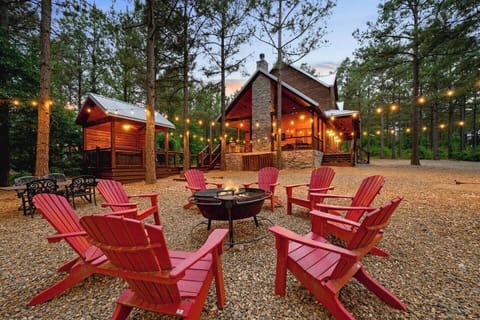 Welcome to Kiamichi Mountain Hideaway! Relax around this fire pit after a long day on the lake.