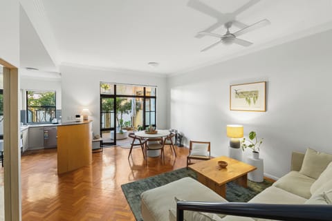 Make yourself at home in the spacious open-plan setting, where a generous lounge, two dining spots, a full kitchen and leafy courtyard views create an inviting setting for everyday living.