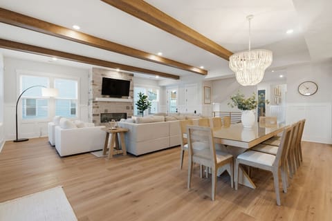 Open-concept living room with comfortable seating, gas fireplace, and plenty of space for everyone to gather.