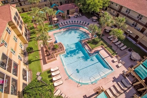 Splash into a fun pool day with shaded seating nearby.