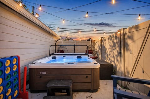 Soak away the day in a private hot tub strung with market lights — the perfect end to a busy Indy itinerary.