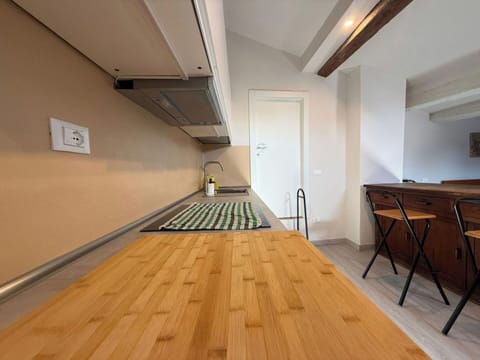 Flooring, Floor, Furniture, Wood, Wood Flooring, Interior Design, Countertop, Kitchen, Ceiling, Lighting
