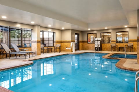 Refresh with a swim in the indoor heated pool, surrounded by natural light and comfortable lounge chairs