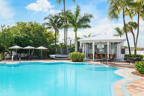 Sip something tropical steps from the sparkling resort pool.