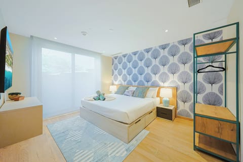 Sink into the plush comfort of your peaceful retreat, where soothing coastal hues and elegant design details invite you to unwind completely.