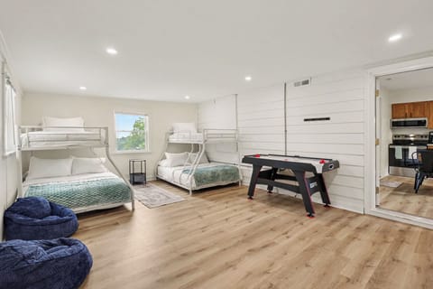 Bunk/game room sleeps 6 with two twin-over-full bunks and air hockey 