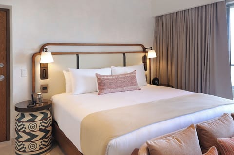 Drift off in a quiet room with blackout curtains drawn.