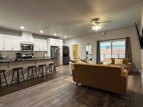 Bright modern living room with stylish seating and large sliding doors