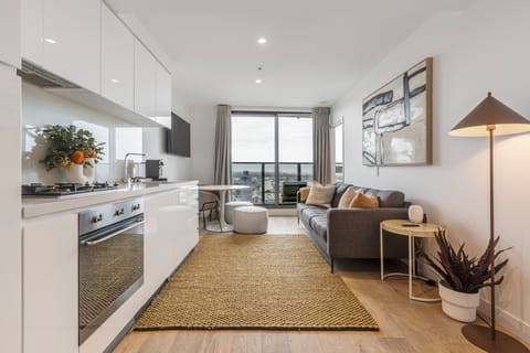 Spend time in the open-plan living area, where the contemporary kitchen, dining setting and comfortable lounge bring everyone together.