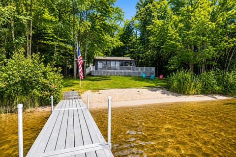 Private Locke Lake waterfront with sandy beach, dock, and Barnstead lake home.