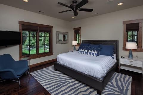 Sink into crisp linens and wake to calming woodland views.