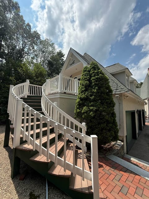 Beautiful stairway leading to a front deck.