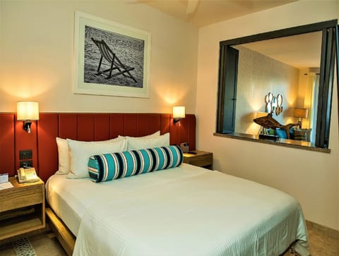 Recharge in a cozy room with soft lighting and plush pillows.
