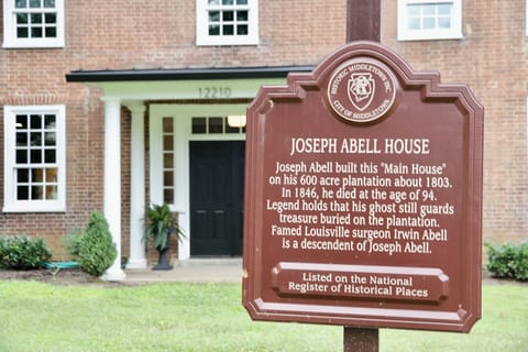 Historic Joseph Abell House with charming brick façade and landmark appeal