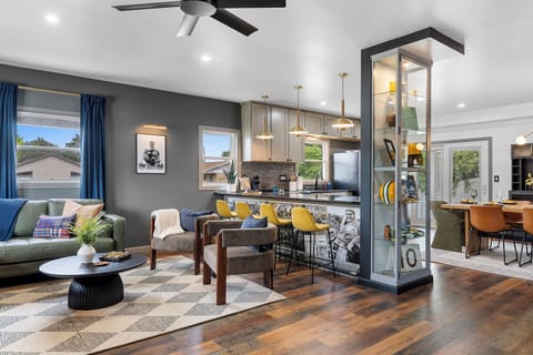 Spacious open-concept living, kitchen and dining area designed for gathering.