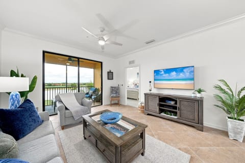 Spacious great room layout with comfy furniture