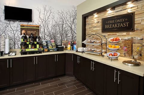 Start your day with fresh fruits, warm pastries, and coffee from the sleek breakfast bar, fueling your adventures ahead