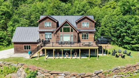 Large 3 level home with multilevel patio and deck, fire pit, hot tub, and amazing views