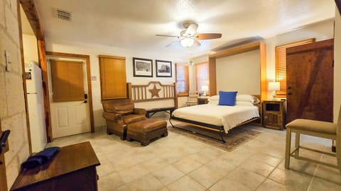 Recharge in the cozy queen-sized Murphy bed & stream your favorites on the smart TV​