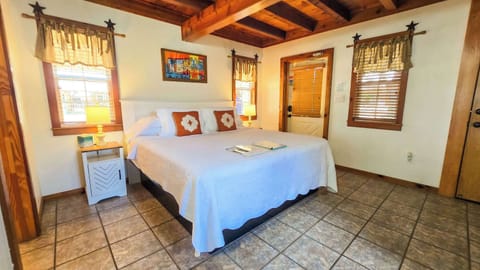 The lower-level studio offers a king-sized bed, full kitchen, & full bath​