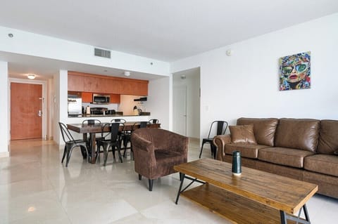 Gather and unwind in this stylish living room—perfect for group stays, celebrations, or cozy nights in the city.