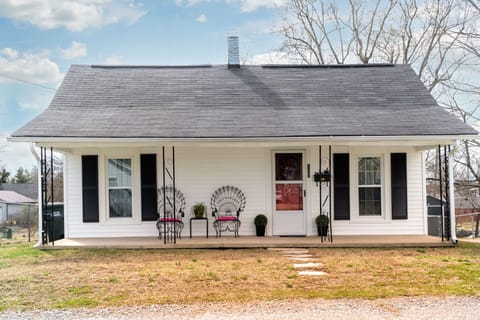 Covered front porch. Parking on street and in driveway.