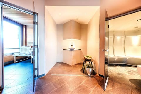 Stroll between sauna and steam areas in peaceful quiet