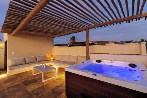 Enjoy your private Jacuzzi rooftop with a spacious sofa lounge and admire the stunning Jericoacoara sunset