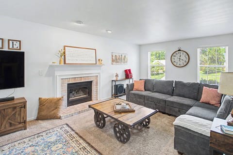 Unwind in the inviting living room & stream your favorites on the smart TV​