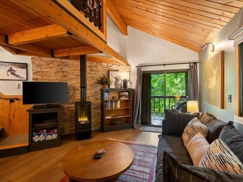 Electric fireplace to enjoy the cozy ambiance and warmth of a fire without the hassle of smoke, ashes, or cleanup.