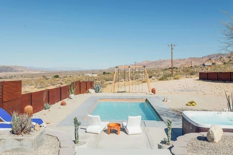 Private desert oasis with pool, hot tub, and sweeping mountain views