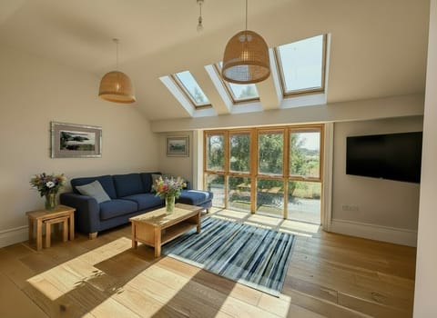 Modern Open-Plan Lounge with Large Feature Window