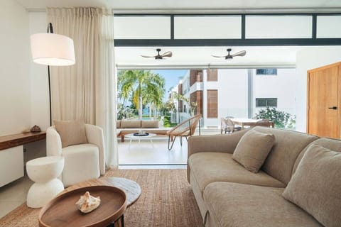 Bright living area with balcony access—easy indoor-outdoor flow and a nice spot to relax.
