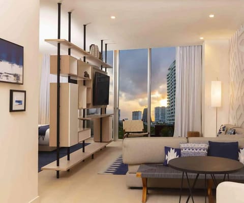 Gather at sunset in the cozy lounge with skyline views.