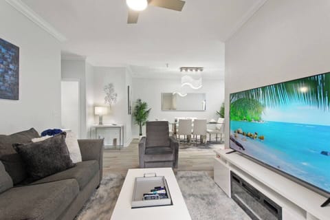 Relax in style with a 75" smart TV with cable TV, cozy electric fireplace, and comfortable seating for four. It also includes the pull out sofa bed.  Enjoy easy access to the patio—perfect for morning coffee or evening wind-downs.