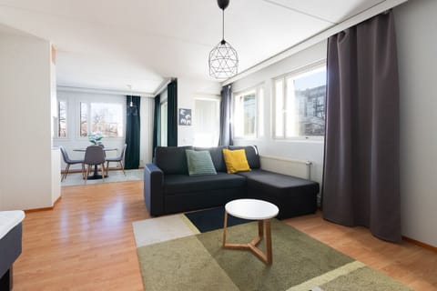The living room with a single bed and sofa bed for two