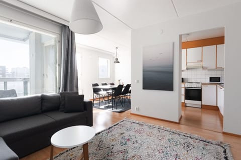 The downstairs has kitchen, dining area and living room with direct access to the balcony