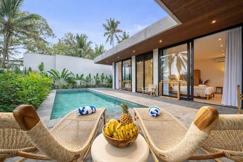 Poolside Oasis: Unwind with tropical views, refreshing dips, and delightful fruit treats!