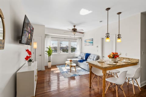 Move easily from breakfast at the dining table to a relaxing movie night in the bright, open living area.