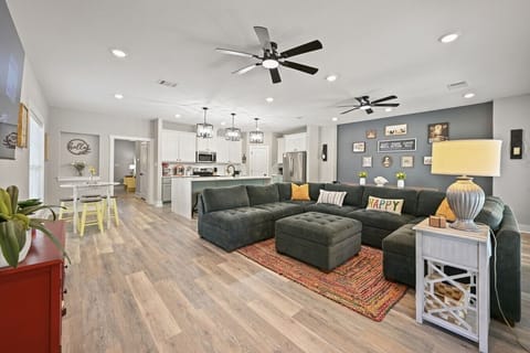 Plenty of room for the whole crew! Spacious open living, dining & kitchen area made for gathering.