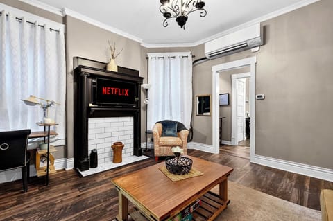 Living Room: Bright and welcoming living room with comfortable seating and a relaxed atmosphere, perfect for unwinding after a day of exploring or enjoying a quiet night in.