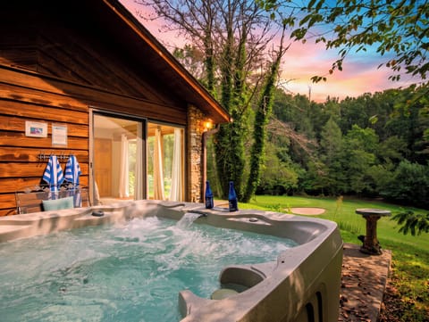 End the day with a soak under a sky that's turning pink