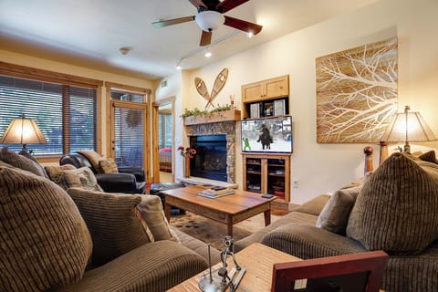 Sink into plush seating by your private fireplace and feel the mountain air outside your windows. Your cozy retreat awaits with warm wood tones and all the comforts of home.