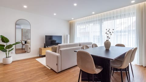 Relax in the spacious living room, where large windows invite ample natural light, or gather around the elegant dining table for memorable meals and conversations. This versatile space is perfect for both quiet evenings and lively gatherings.
#SpaciousLiv
