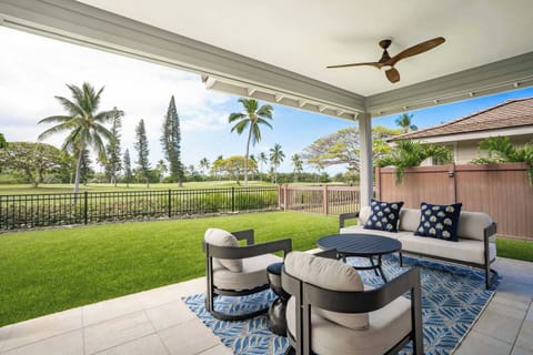 Open-air living overlooking the Kona Country Club fairways